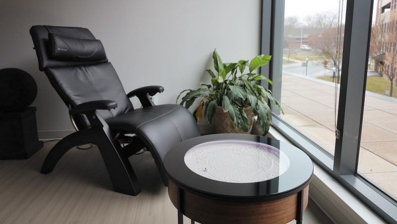 Easy chair facing a window in the Cook Counseling Center serenity space